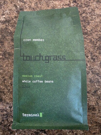 Bag of coffee beans called Touch Grass
